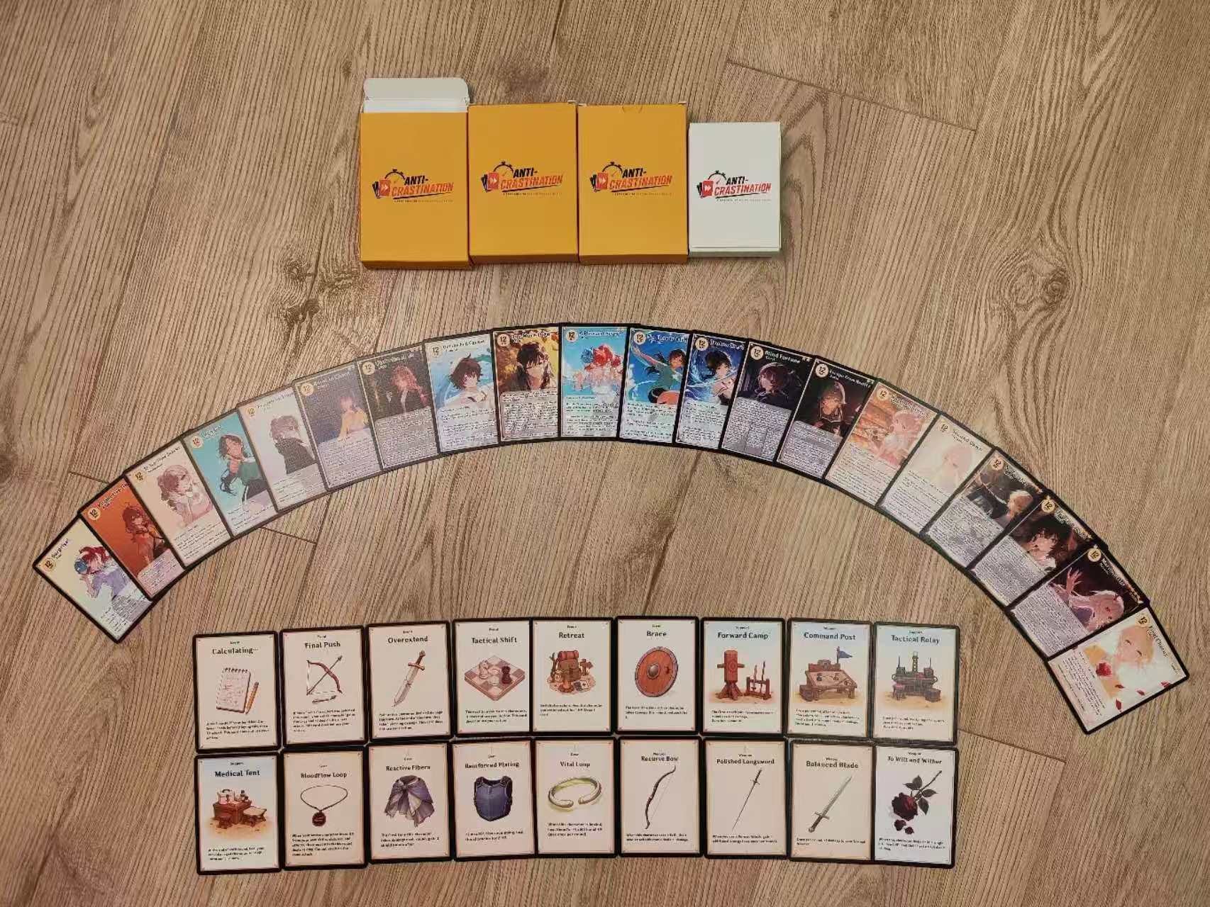 Anti-Crastination 40-card physical prototype arranged with deck boxes